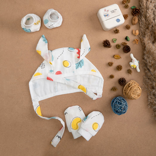 MUSLIN-CAP-MITTEN-BOOTIES-SUNNY SCRIBBLES